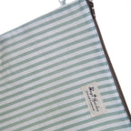 Neceser Clutch Rayas Verde Agua – Viaje y Playa